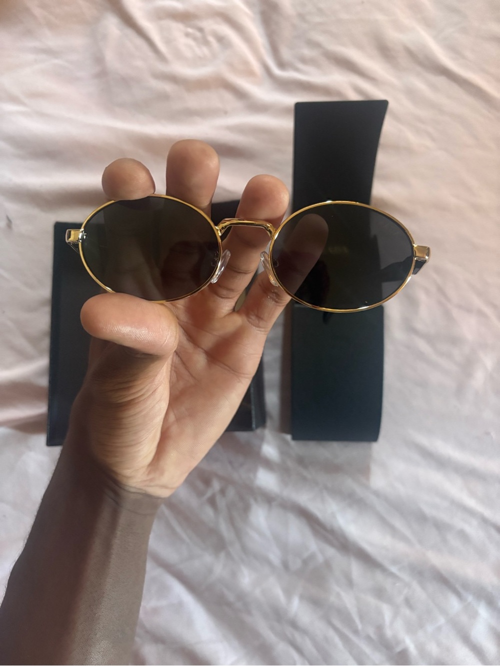 Prada Gold Frame Black Lens Oval Women's Sunglasses